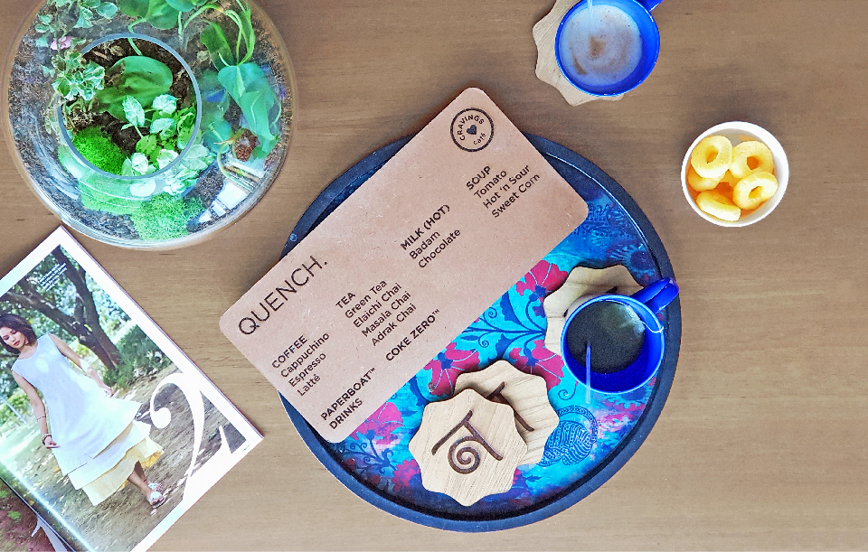 Mood and menu design for Cravings, a café inside Nimaaya women's hospital — Surat, India.
